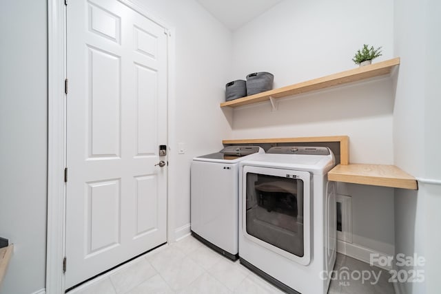 1107 Castle Rd, Indian Land, SC 29707 - washroom featuring washing machine and dryer and baseboards
