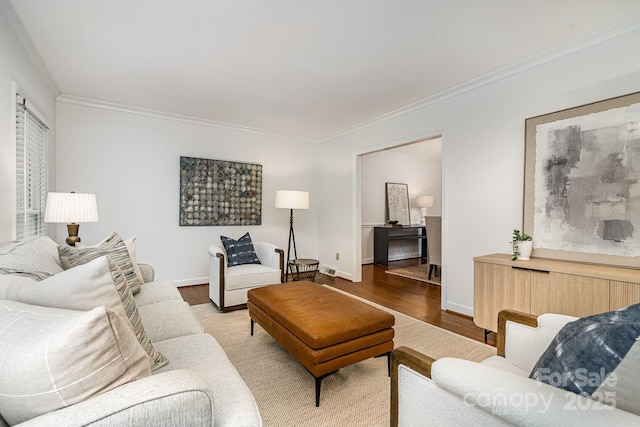 1209 Alfred St, Charlotte, NC 28211 - living room with ornamental molding, wood finished floors, and baseboards