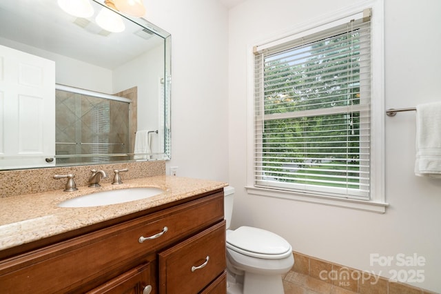 1209 Alfred St, Charlotte, NC 28211 - bathroom featuring vanity, a stall shower, and toilet