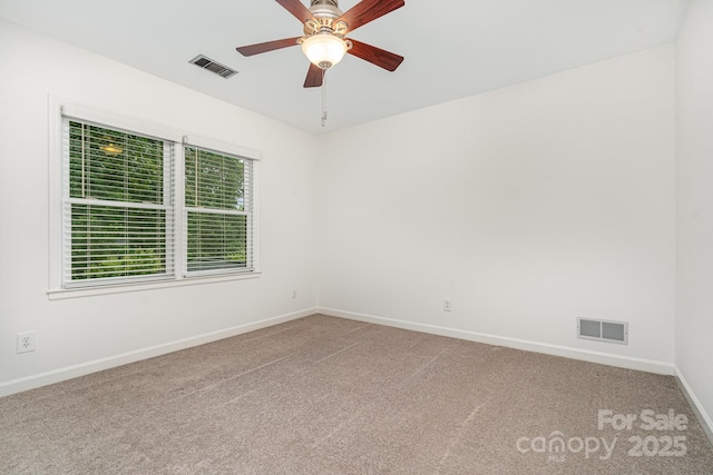 1209 Alfred St, Charlotte, NC 28211 - empty room with carpet floors, baseboards, and a ceiling fan