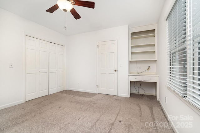 1209 Alfred St, Charlotte, NC 28211 - unfurnished bedroom with carpet, baseboards, and a ceiling fan