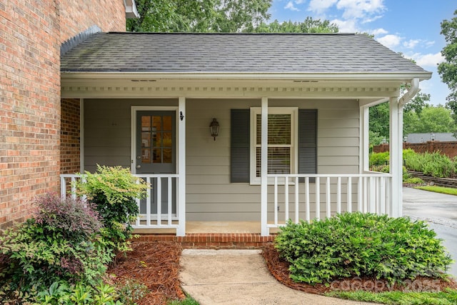 1209 Alfred St, Charlotte, NC 28211 - entrance to property with a porch and a shingled roof