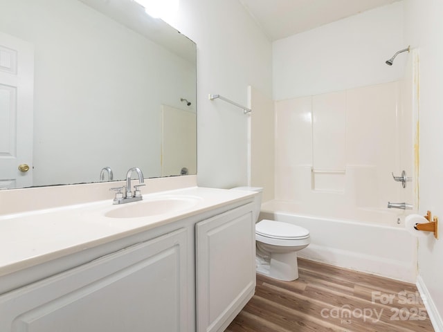 6212 Derryfield Dr, Charlotte, NC 28213 - bathroom featuring vanity, bathing tub / shower combination, and wood finished floors