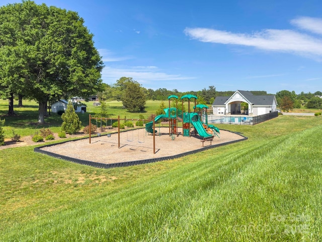 communal playground with a lawn
