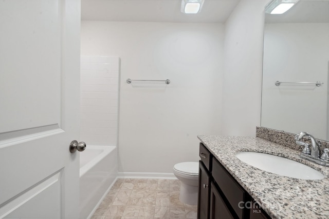 full bathroom with vanity, baseboards, and toilet