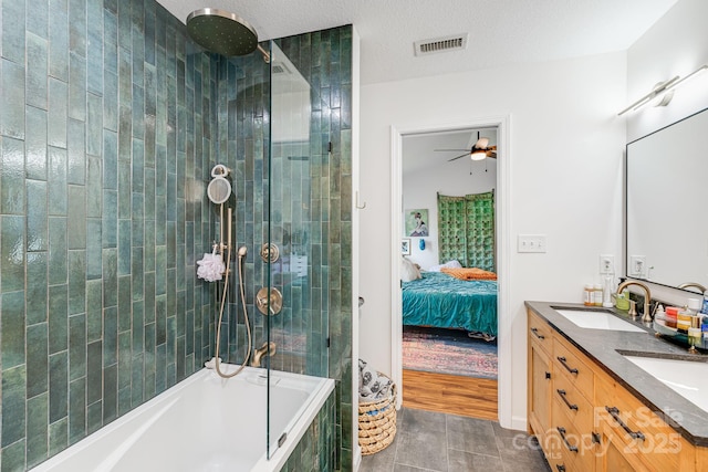full bathroom featuring a sink, tile patterned floors, ensuite bath, and visible vents