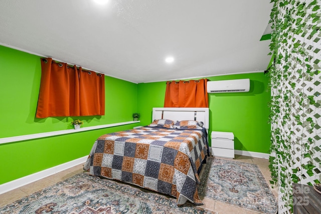 bedroom featuring a wall mounted air conditioner, tile patterned flooring, baseboards, and recessed lighting