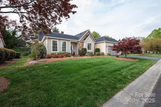ranch-style house featuring a garage, a chimney, driveway, and a front lawn