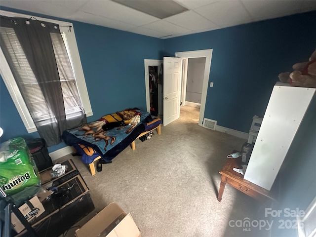 2511 Chapel Hill Rd, Durham, NC 27707 - carpeted bedroom with baseboards, visible vents, and a paneled ceiling
