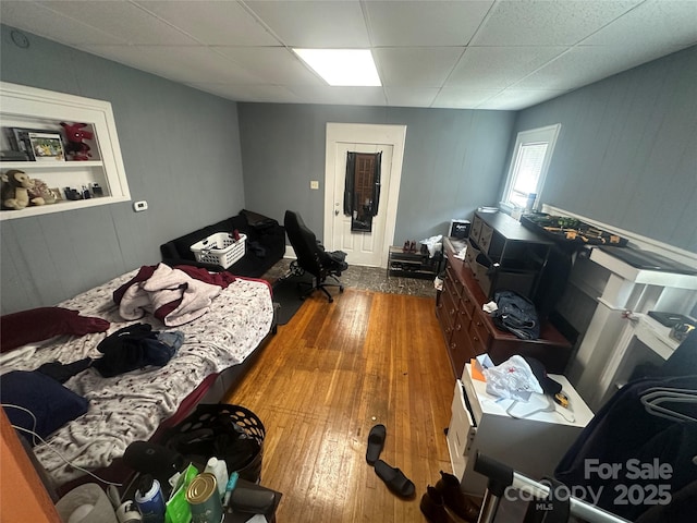 2511 Chapel Hill Rd, Durham, NC 27707 - bedroom featuring a drop ceiling and hardwood / wood-style floors