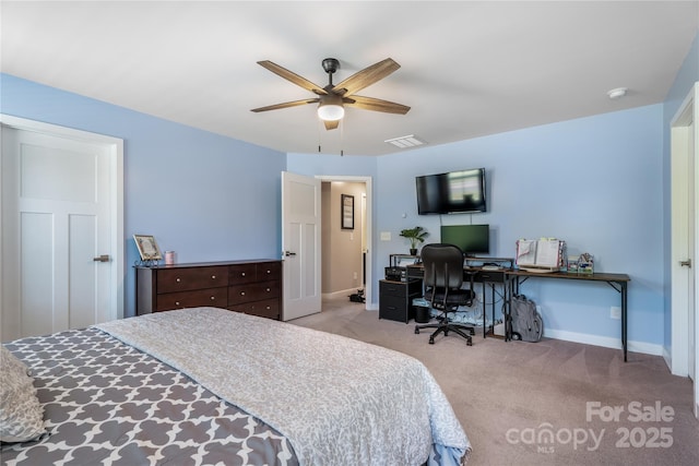 bedroom featuring baseboards, light colored carpet, ceiling fan, and visible vents