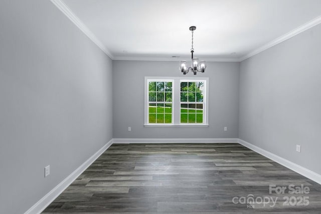 2694 Woodcrest Dr SW, Concord, NC 28027 - spare room with crown molding, baseboards, a notable chandelier, and dark wood finished floors