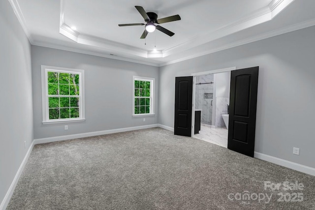 2694 Woodcrest Dr SW, Concord, NC 28027 - unfurnished bedroom featuring crown molding, carpet flooring, baseboards, and a tray ceiling