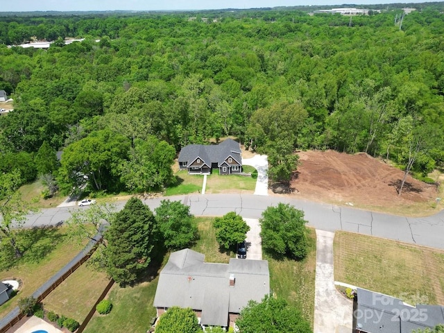 2694 Woodcrest Dr SW, Concord, NC 28027 - birds eye view of property with a wooded view