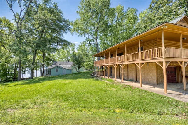 993 Jackson Rd, Fort Lawn, SC 29714 - view of yard with concrete driveway, a wooden deck, and a garage