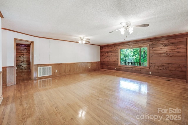 993 Jackson Rd, Fort Lawn, SC 29714 - spare room featuring a textured ceiling, visible vents, and a ceiling fan