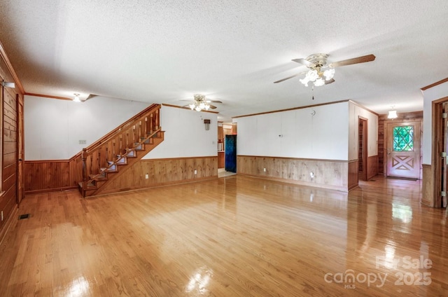 993 Jackson Rd, Fort Lawn, SC 29714 - unfurnished living room featuring ceiling fan, a textured ceiling, and wood finished floors