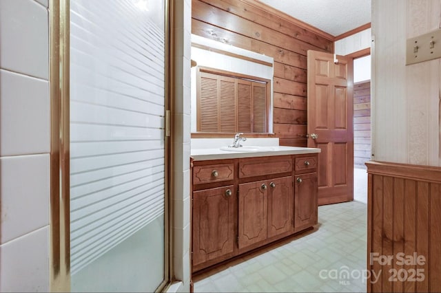 993 Jackson Rd, Fort Lawn, SC 29714 - bathroom featuring ornamental molding, tile patterned floors, vanity, and wood walls