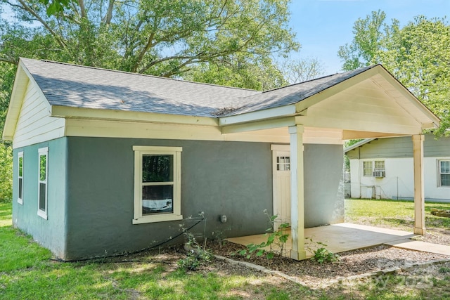 814 Marve St, Gastonia, NC 28052 - view of front facade featuring roof with shingles, a patio, and stucco siding