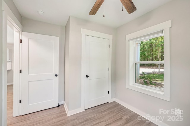 814 Marve St, Gastonia, NC 28052 - unfurnished bedroom with a ceiling fan, baseboards, and light wood finished floors