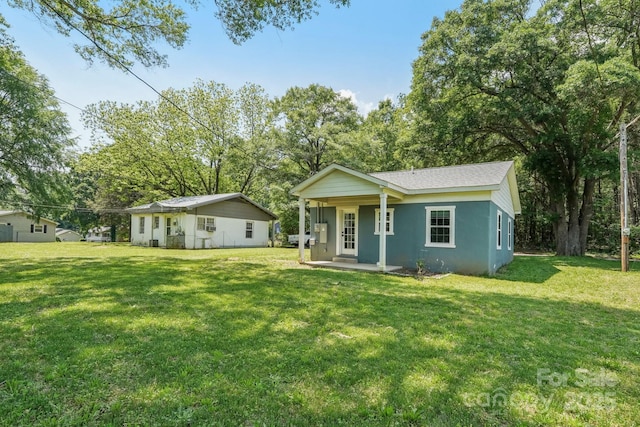 814 Marve St, Gastonia, NC 28052 - view of front of property featuring a porch, a front yard, and stucco siding