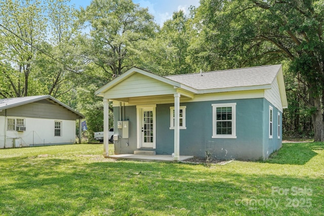 814 Marve St, Gastonia, NC 28052 - ranch-style house featuring roof with shingles, cooling unit, a front yard, and stucco siding