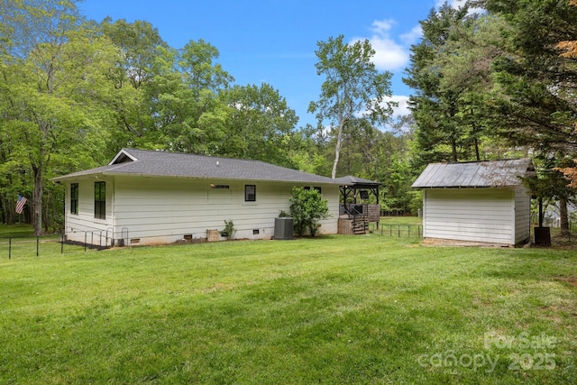 17403 Green Hill Rd, Charlotte, NC 28278 - rear view of property with crawl space, central AC, an outdoor structure, and a storage unit