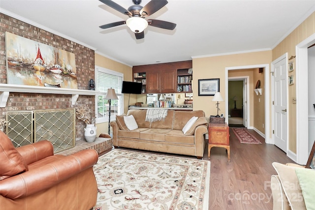 10209 Thomas Payne Cir, Charlotte, NC 28277 - living area with crown molding, baseboards, a ceiling fan, and wood finished floors