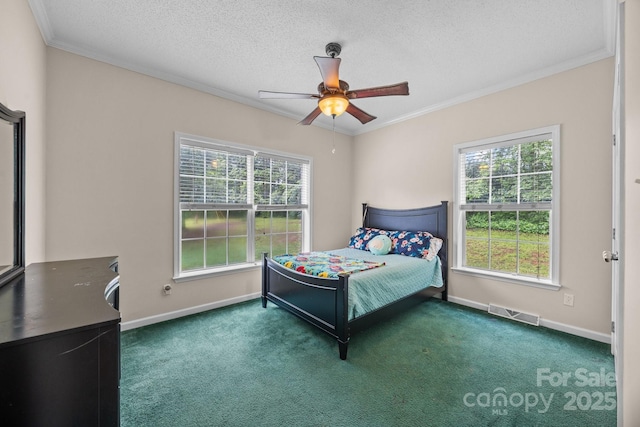 bedroom featuring crown molding, carpet floors, multiple windows, baseboards, and a textured ceiling