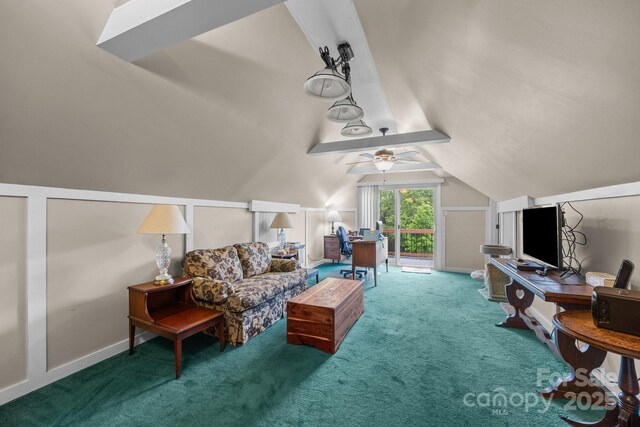 living area featuring carpet flooring, an office area, vaulted ceiling, and ceiling fan
