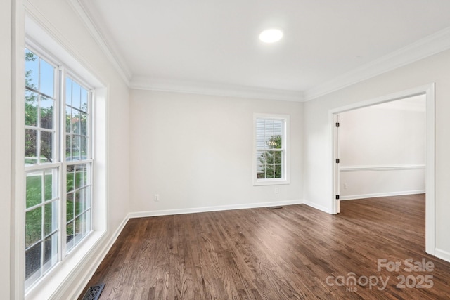 5745 Snapdragon Ln, Huntersville, NC 28078 - unfurnished room with plenty of natural light, ornamental molding, and dark wood-style floors