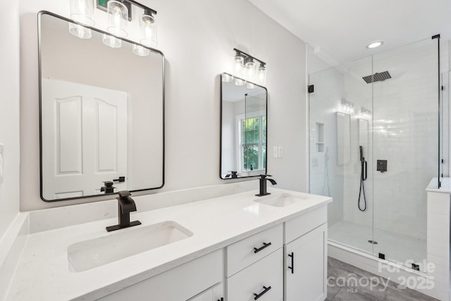 5745 Snapdragon Ln, Huntersville, NC 28078 - bathroom with double vanity, a sink, recessed lighting, and a shower stall