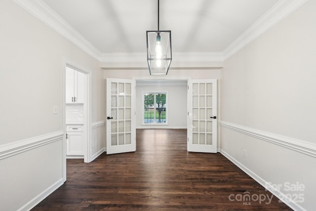 5745 Snapdragon Ln, Huntersville, NC 28078 - unfurnished dining area with crown molding, dark wood-style flooring, and french doors