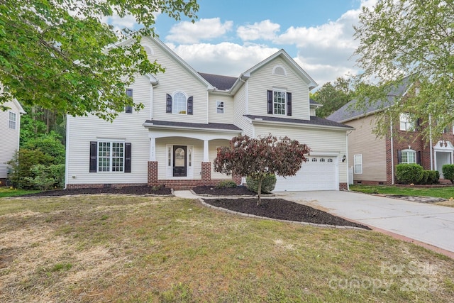 5745 Snapdragon Ln, Huntersville, NC 28078 - traditional-style home featuring a garage, a front lawn, covered porch, and driveway