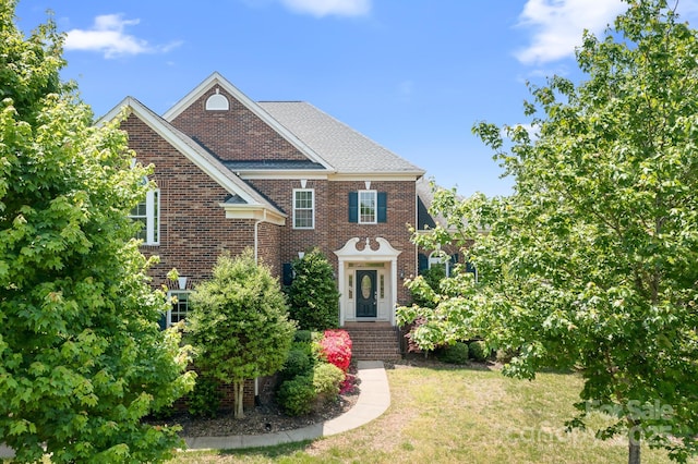 7525 Blackgum Falls Ct, Huntersville, NC 28078 - view of front of house featuring a front lawn and brick siding