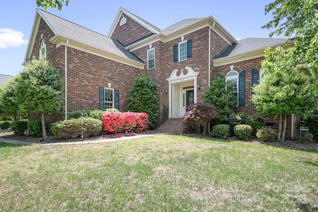 7525 Blackgum Falls Ct, Huntersville, NC 28078 - colonial inspired home with brick siding and a front lawn