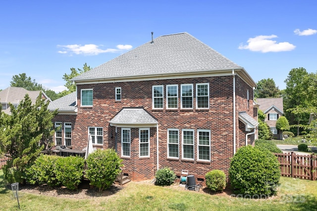 7525 Blackgum Falls Ct, Huntersville, NC 28078 - back of property with a lawn, brick siding, fence, and roof with shingles