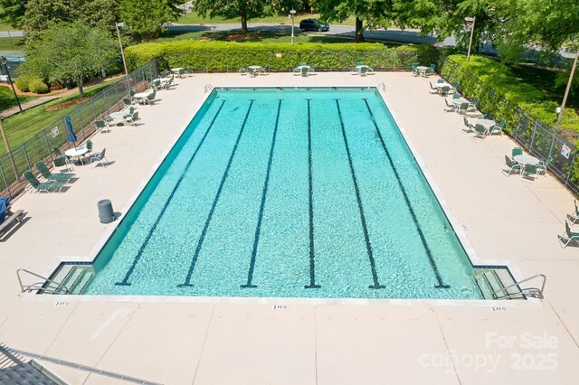 7525 Blackgum Falls Ct, Huntersville, NC 28078 - community pool with fence and a patio area
