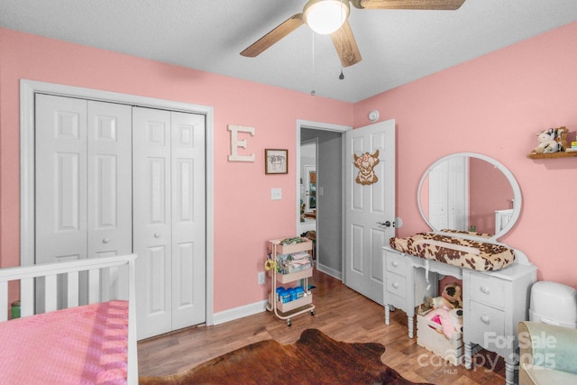 1800 Oriole Ct, Monroe, NC 28112 - bedroom with a ceiling fan, baseboards, wood finished floors, and a closet