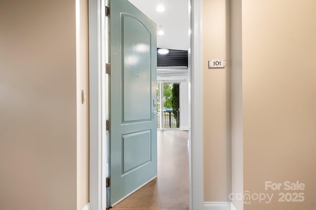 interior space with recessed lighting and finished concrete flooring