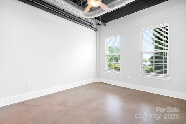 2338 Yadkin Ave Unit 101, Charlotte, NC 28205 - spare room featuring finished concrete flooring and a ceiling fan