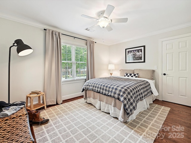 4701 Pineland Pl, Charlotte, NC 28277 - bedroom with crown molding, wood finished floors, baseboards, and ceiling fan