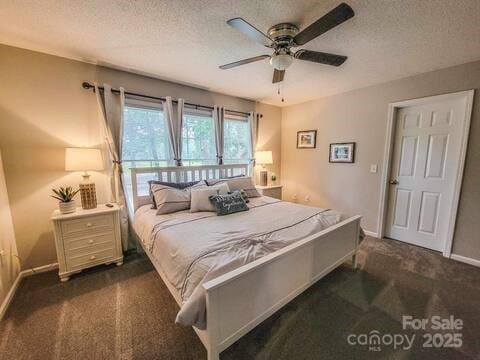 6231 Kentwood Dr, Kannapolis, NC 28081 - bedroom featuring carpet floors, a textured ceiling, and ceiling fan