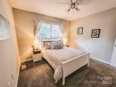 6231 Kentwood Dr, Kannapolis, NC 28081 - carpeted bedroom with baseboards and a ceiling fan