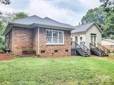 6231 Kentwood Dr, Kannapolis, NC 28081 - rear view of property featuring crawl space, brick siding, and a lawn