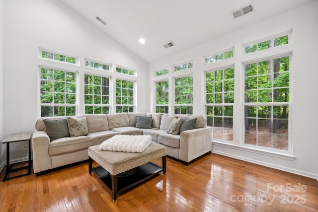 109 Braxton Gate Ct, Mount Holly, NC 28120 - living room with hardwood / wood-style flooring, high vaulted ceiling, and baseboards