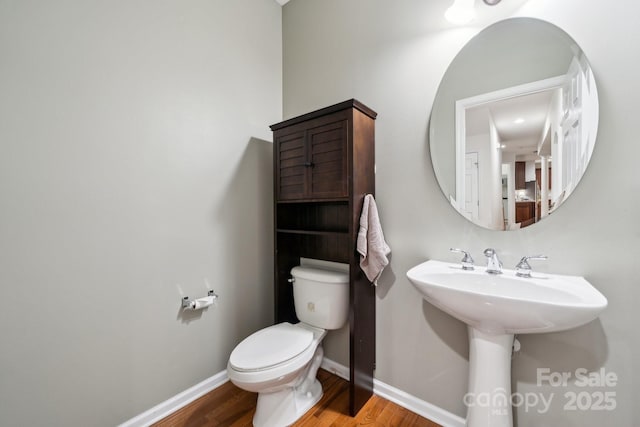 109 Braxton Gate Ct, Mount Holly, NC 28120 - bathroom featuring wood finished floors and toilet