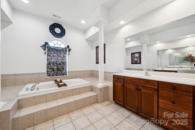 109 Braxton Gate Ct, Mount Holly, NC 28120 - full bath with decorative columns, a garden tub, vanity, and recessed lighting