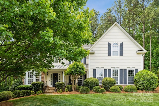 109 Braxton Gate Ct, Mount Holly, NC 28120 - view of front facade with a front lawn and a standing seam roof