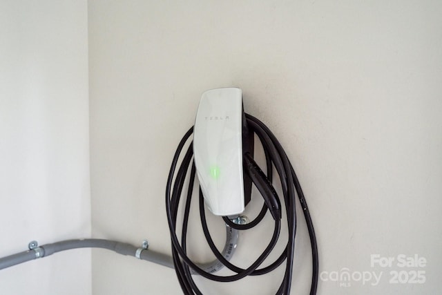 109 Braxton Gate Ct, Mount Holly, NC 28120 - garage view of electric vehicle charger